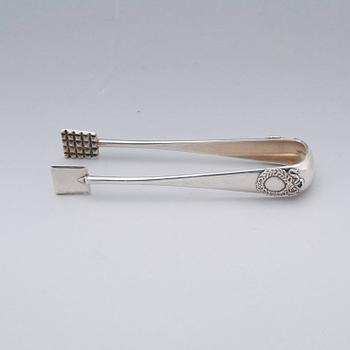 A Fabergé 20th century silver sugar-tongs, work master Anders Michelsen 1908-1917. Imperial Warrant.