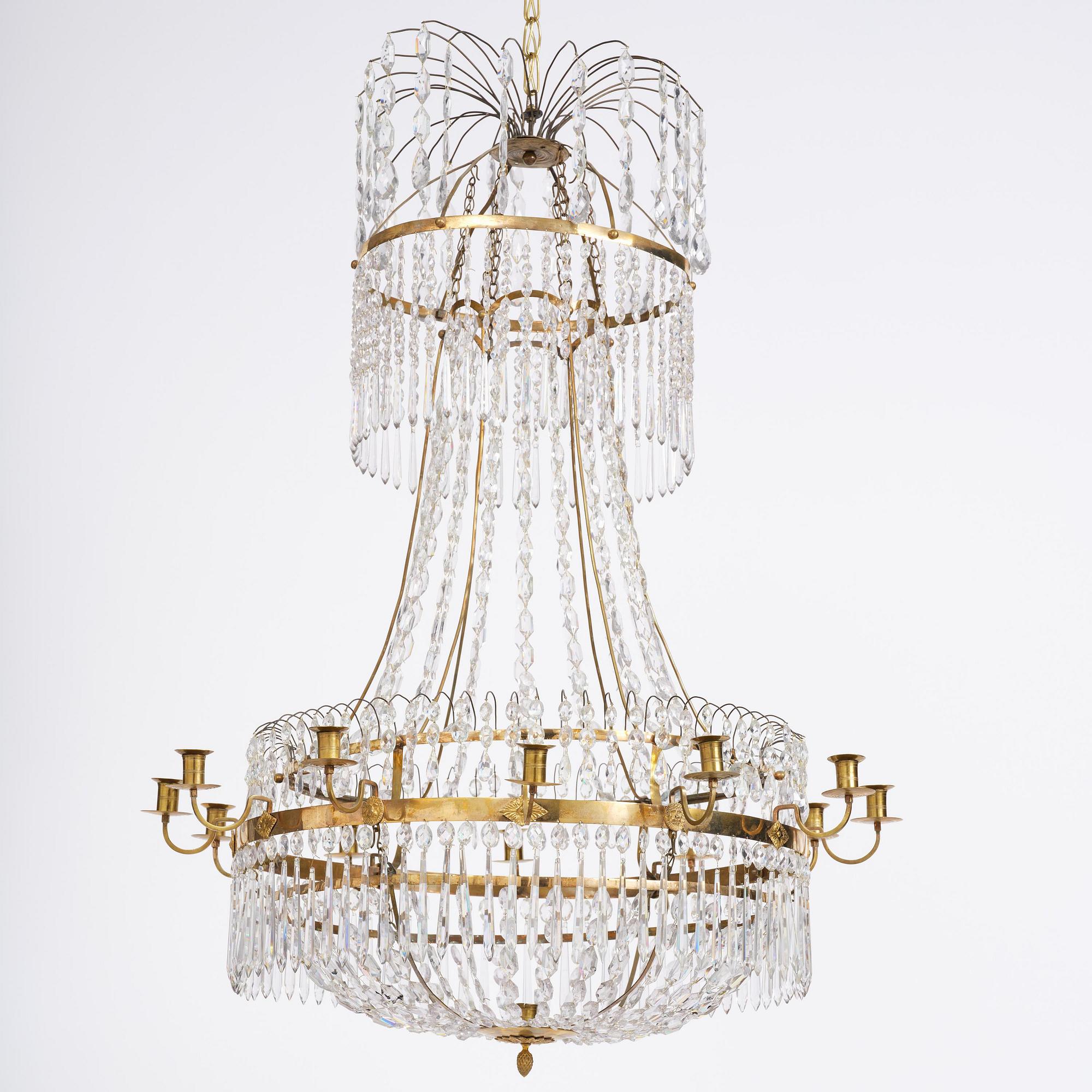 A late Gustavian thirteen-light gilt brass and cut glass chandelier, Stockholm, late 18th century.