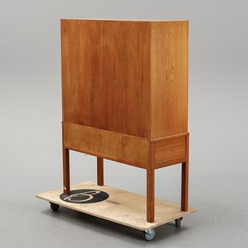 Carl Malmsten, a 'October' cabinet from the second half of the 20th century.
