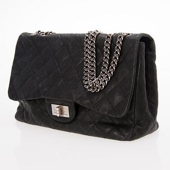 CHANEL Caviar Reissue 2.55 Jumbo Single Flap Bag.
