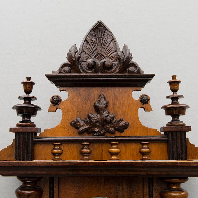 A neo renaissance German Junghans wall clock from around the turn of the 20th Century.