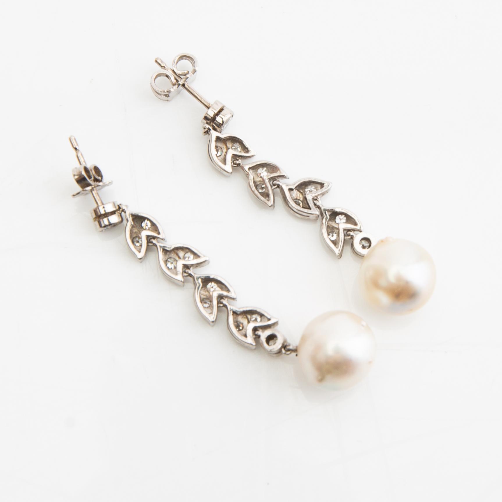 Earrings, a pair, 18k white gold with pearls and diamonds.