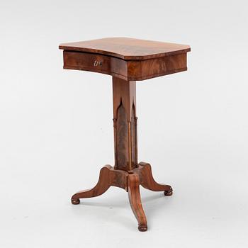 A mid 19th century mahogany work table.