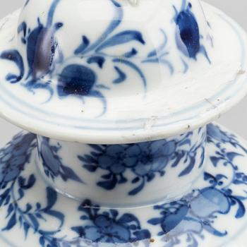 A set of three blue and white porcelain urns 19th century.