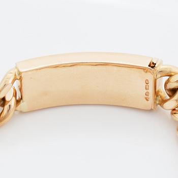 A 14K gold bracelet.