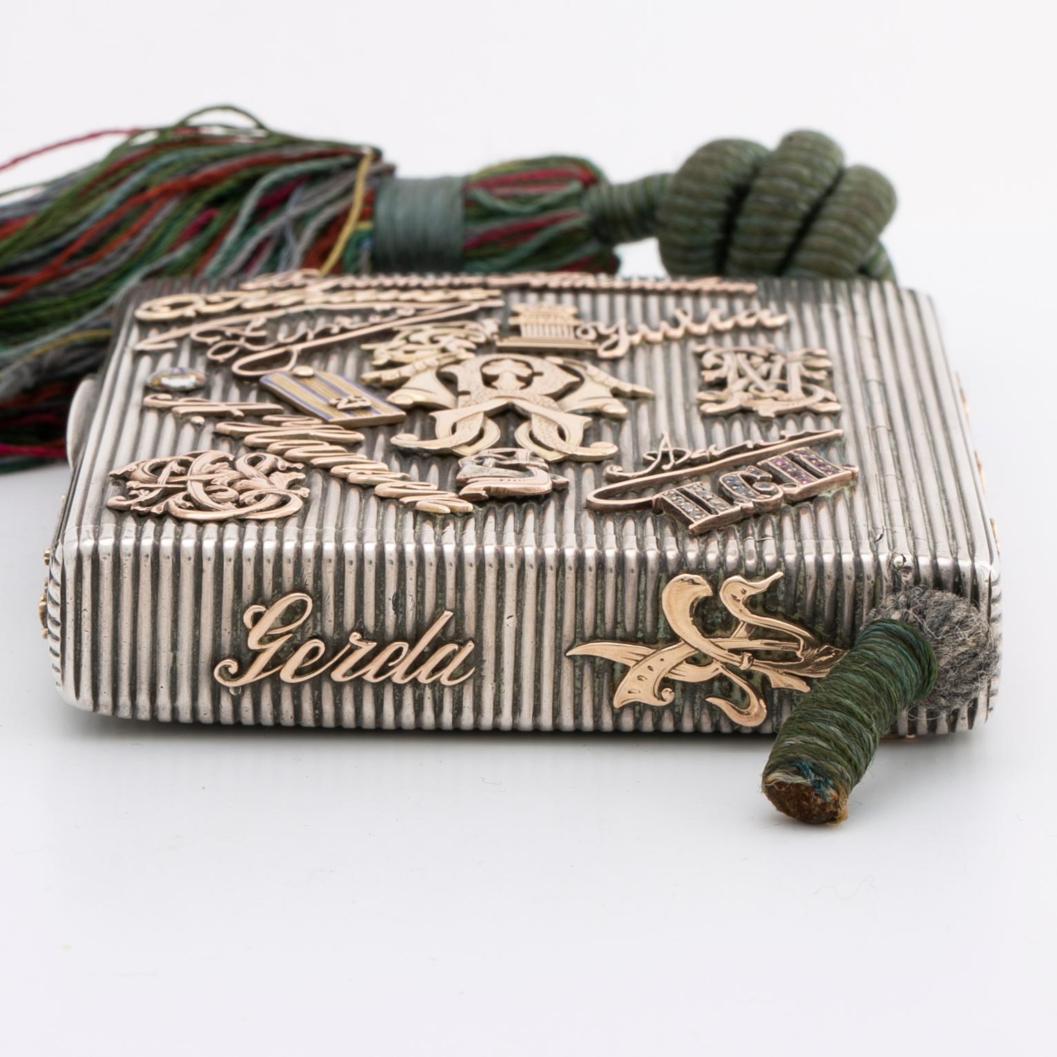 Silver box, gold, enamel, rose-cut diamonds, saphires and rubies (possibly synthetic), silk chord, St Petersburg.
