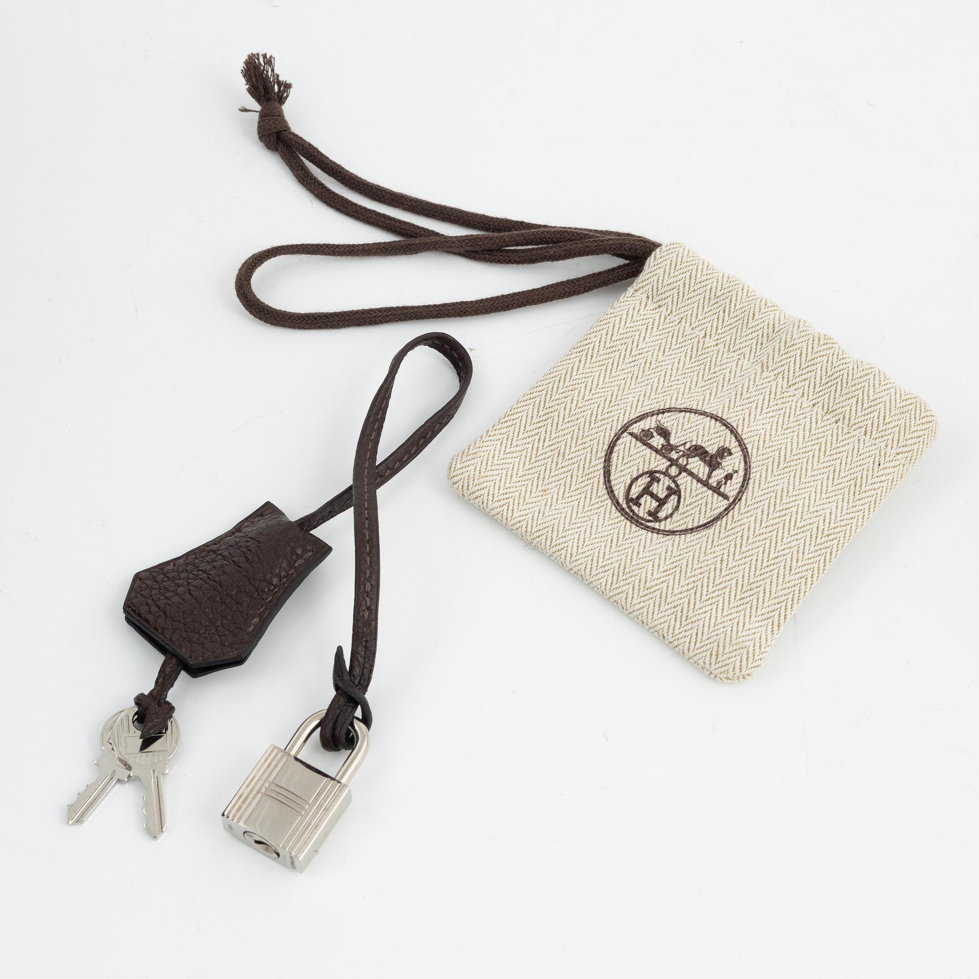 Hermès, a chocolate brown Togo leather 'Birkin 35' handbag, 2008.