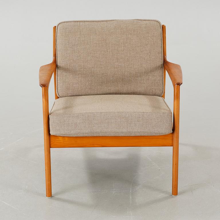 A 1960s armchair, 'USA 75', by Folke Ohlsson for Dux.