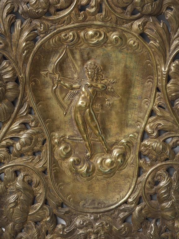 A set of four Swedish Baroque repoussé silvered brass reflector one-branch reflector plates, ca 1690-1700.