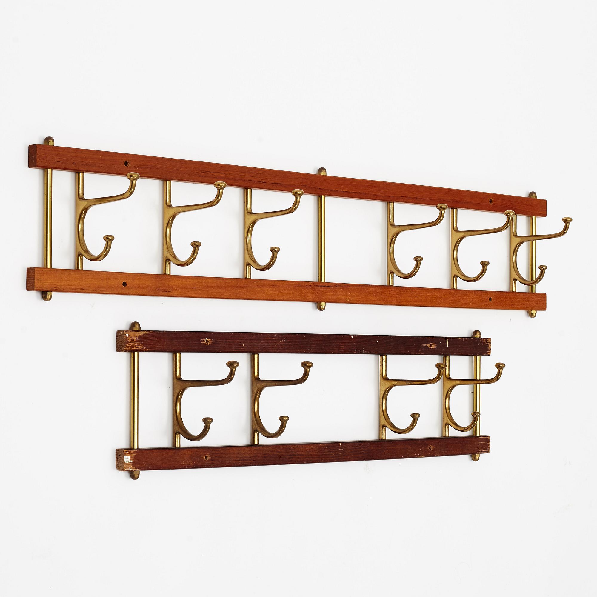 Two 'Dekorativ' coat hangers, Skogslunds metallgjuteri, Anderstorp, mid 20th Century.