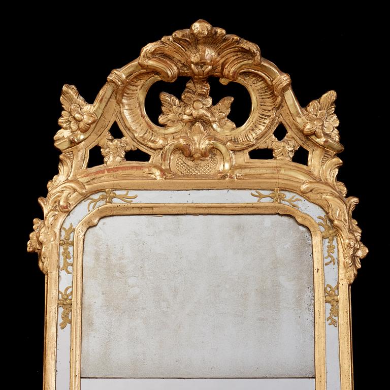 A Swedish Rococo 18th century mirror, dated 1769.