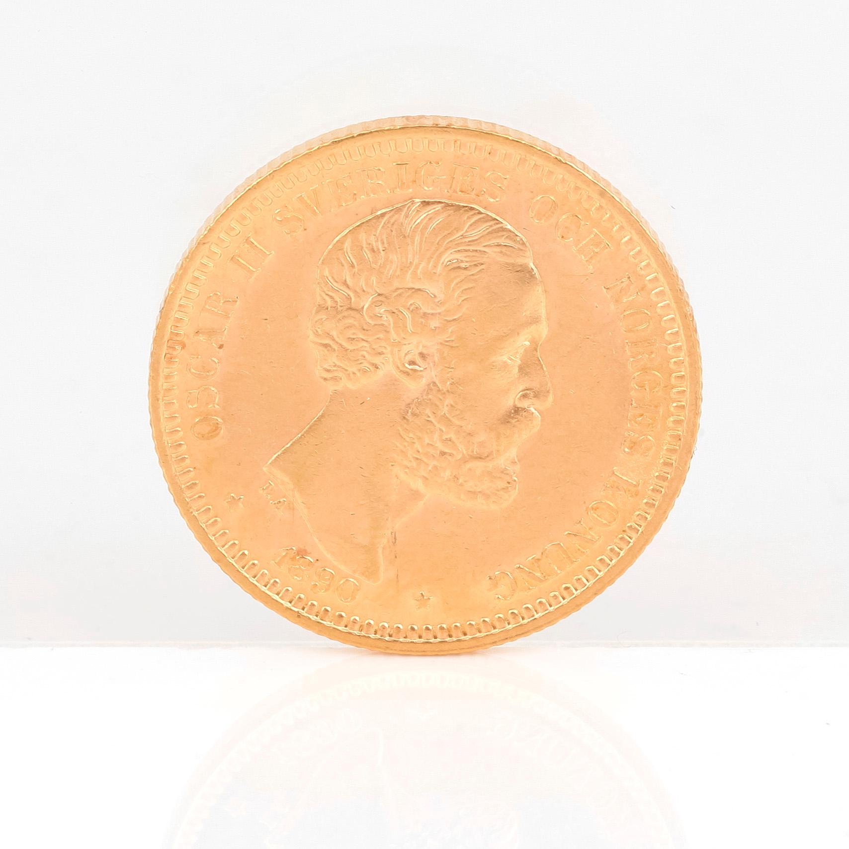 GULDMYNT, 20 kronor, Oscar II av Sverige och Norge 1890. Vikt ca 9 gram.