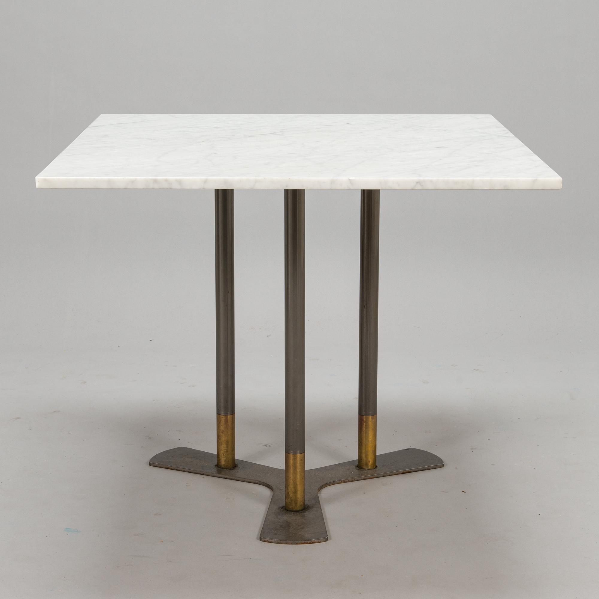 A marble top table, 21th century.