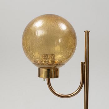 Bergboms, a pair of model 'G-118', brass and glass floor lamps. Second half of the 20th century.