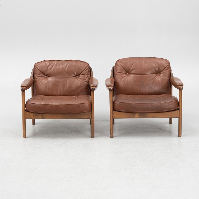 A pair of 1970's armchairs.