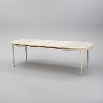 A dining table and six chairs by Carl Malmsten for Bodafors.