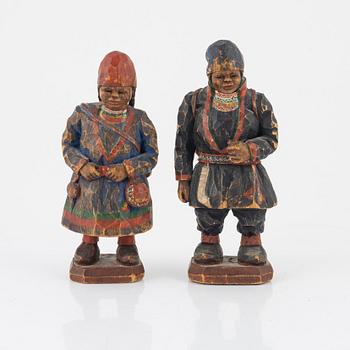 Torborg Lindberg-Karlsson, a pair of figurines, carved and painted wood, signed TL.