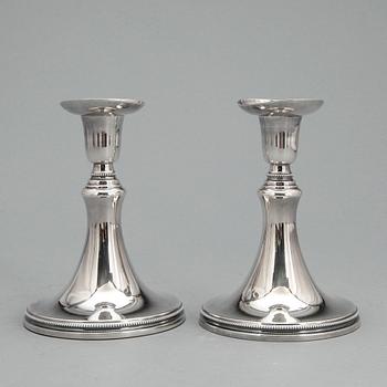 LJUSSTAKAR, ett par, silver, Eric Löfman, MGAB, Uppsala, 1956. Total vikt ca 469 g.