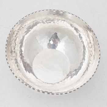A pair of Swedish silver candlesticks, and a bowl, 1930s–60s.