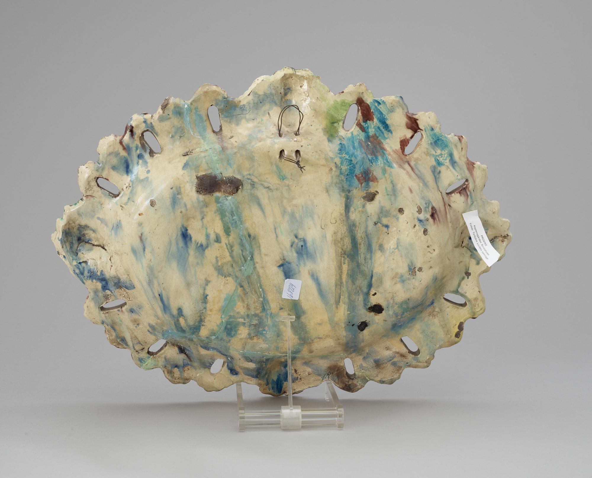 A majolica charger in the style of Pallisy, 'Istoriato'.