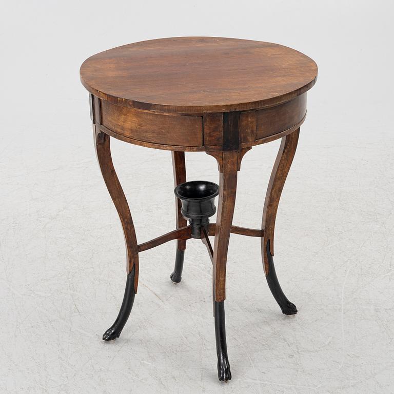 An Empire table, northern Europe, early 19th century.