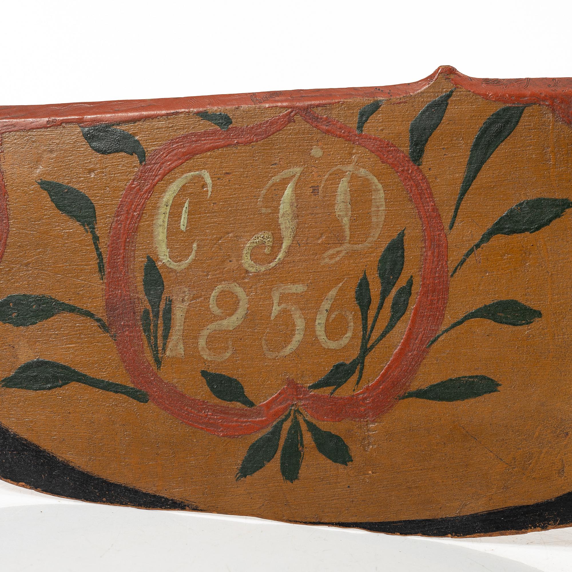 A carved and polychrome painted folk art wedding gift, Sweden, dated 1856.