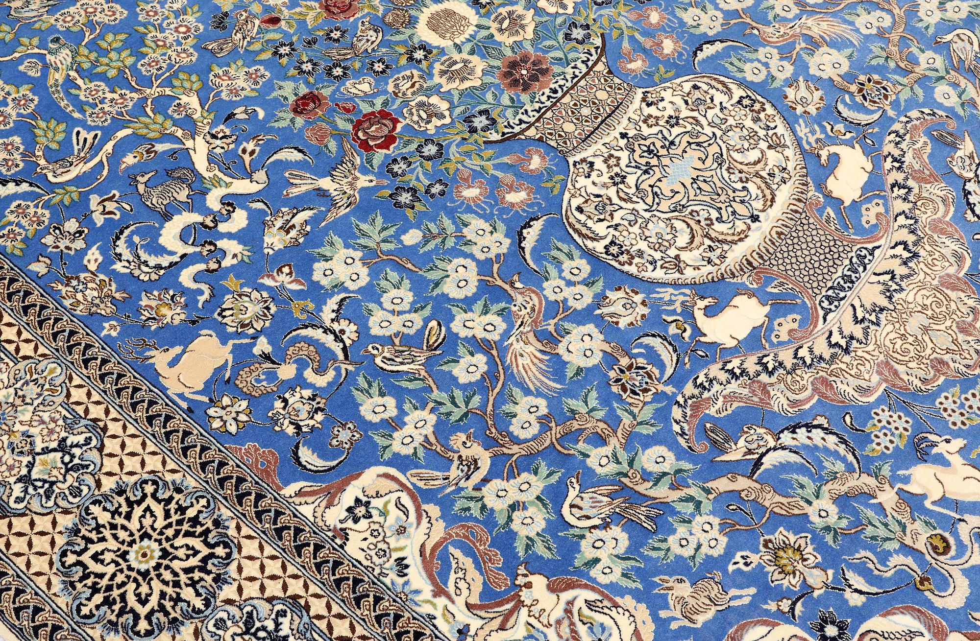 A Figural Nain-Isfahan carpet, part silk, 318 x 213 cm.