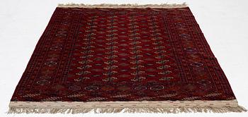 An old Turkmen carpet, c. 235 x 175 cm.