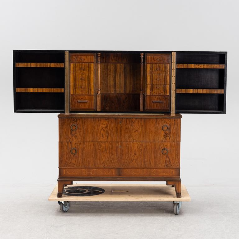 Erik Chambert, a mahogany and rosewood veneered Swedish Grace secretaire, Chamberts Möbelfabrik, 1920's/30's.