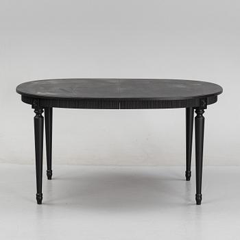 A Gustavians style dining table, second half of the 20th Century.