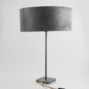 A pair of "Pewter" table lamps with different lampshades from Artwood.