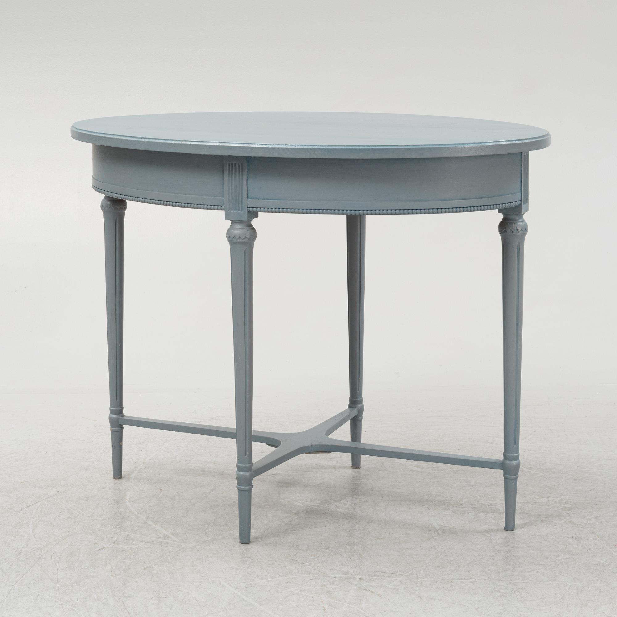 A painted sofa, table, a pair of chairs, a pair of armchairs, a pair of stools, Gustavian style, 20th Century.