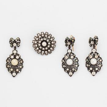 Earrings, brooch, and pendant silver with paste.
