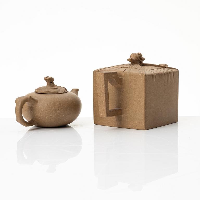 Two yellow yixing teapots, China, 1980/90s.