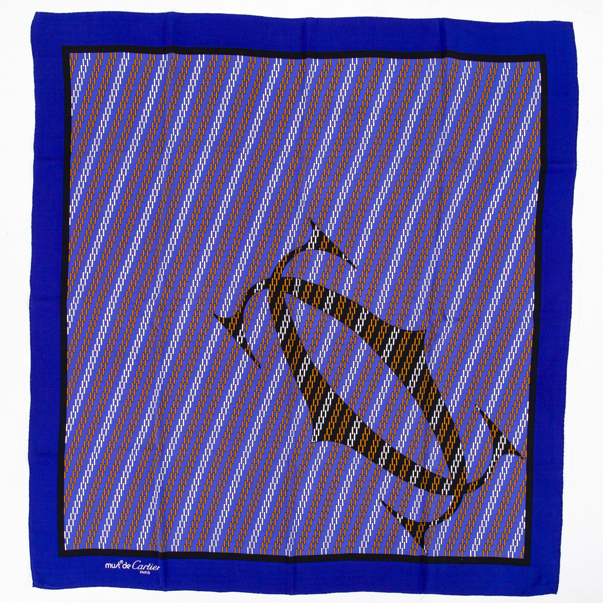 must de Cartier, a silk scarf.