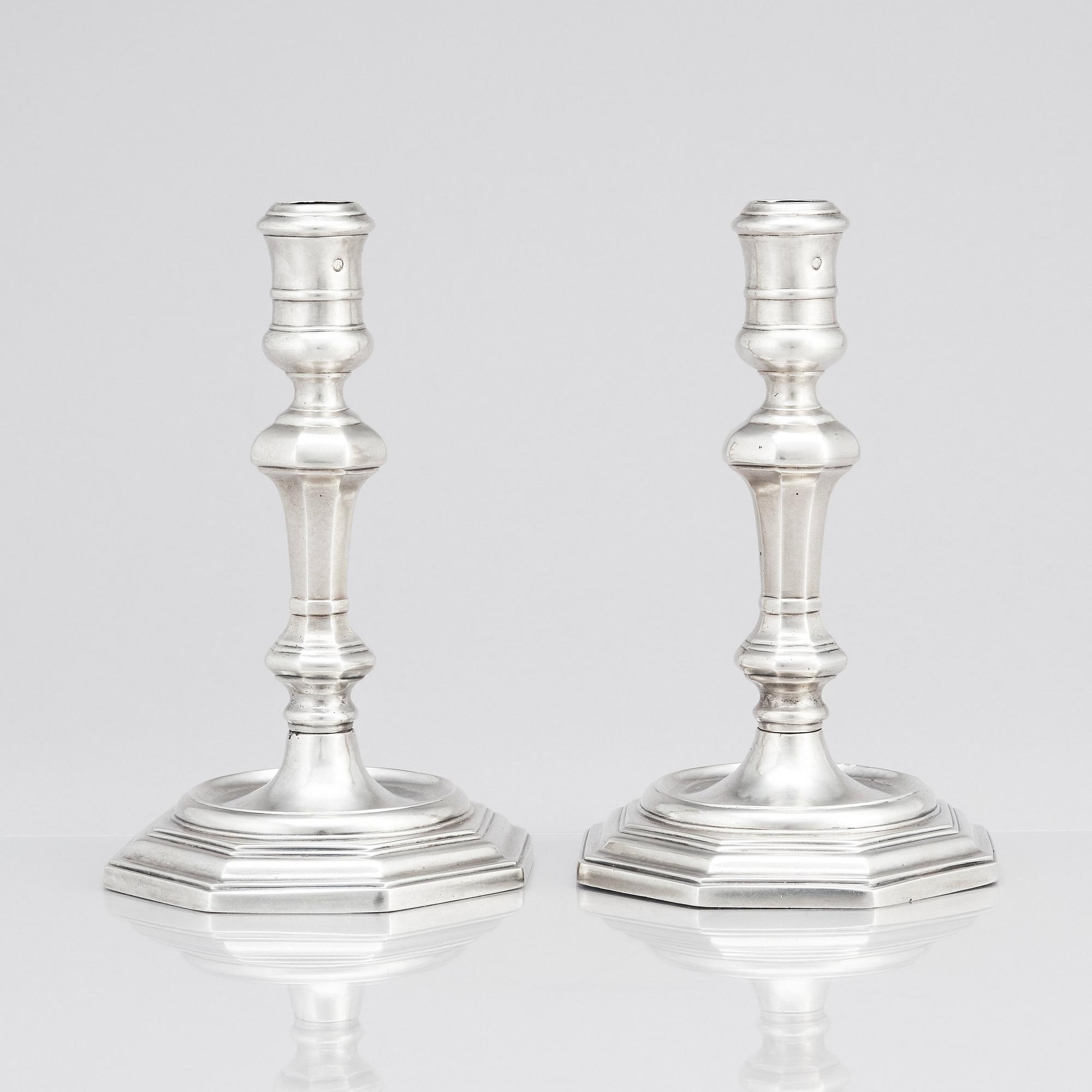 A pair of Italian late 17th/early 18th Century silver candlesticks. Marks of Johann Adolf Gaap (born 1667, died 1724).