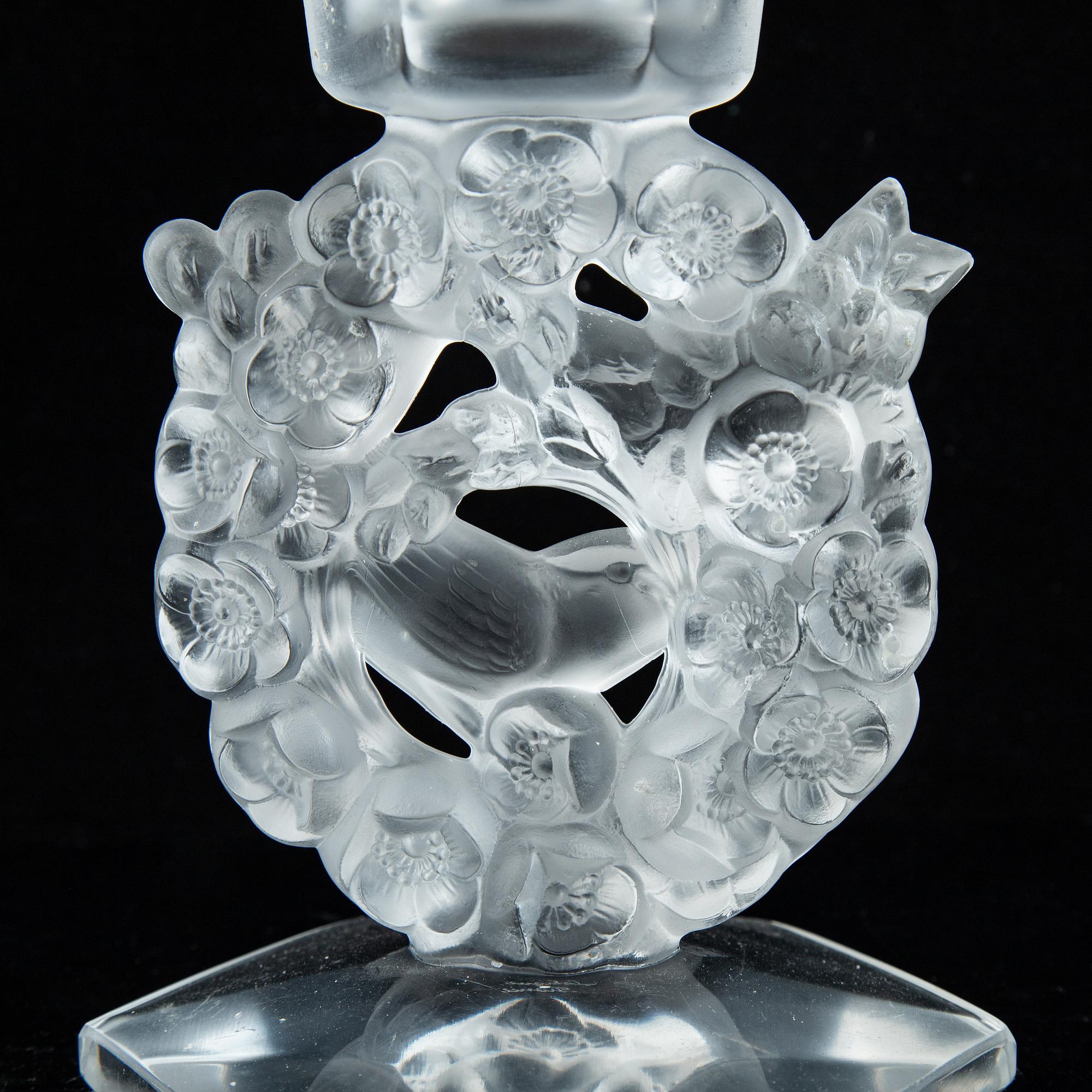 Lalique, a pair of glass candlestick, signed Lalique France, second half of the 20th century.