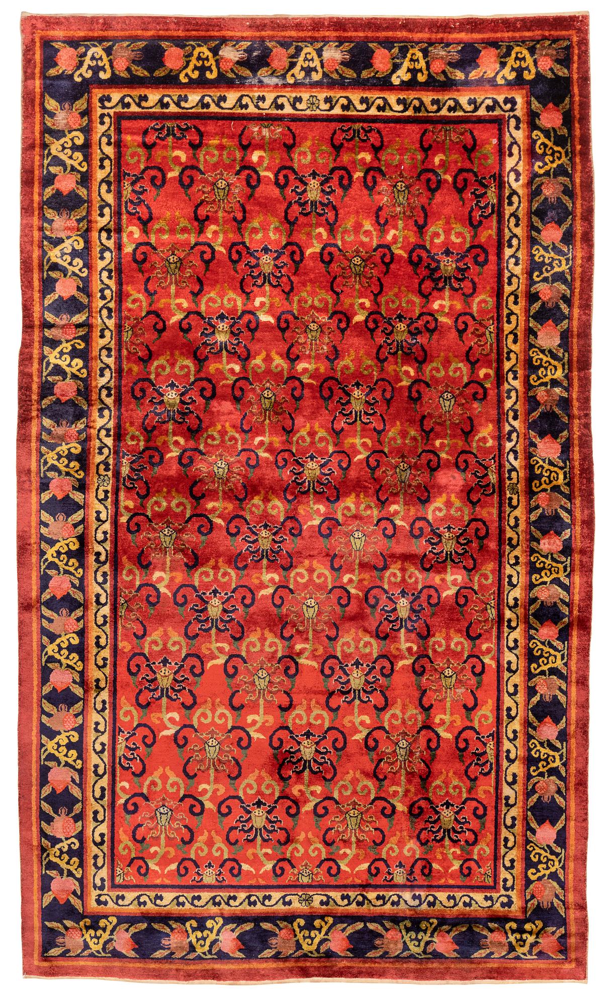 An East Turkestan silk carpet, ca 308 x 182 cm.