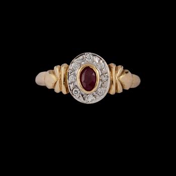RING, 18k guld md fasettslipad blå safir samt 8 briljantslipade diamanter, totalt ca 0.24 ct. Vikt 3 g.