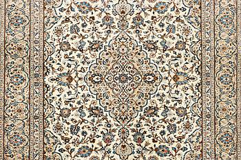 A Keshan carpet, a. 395 x 286 cm.
