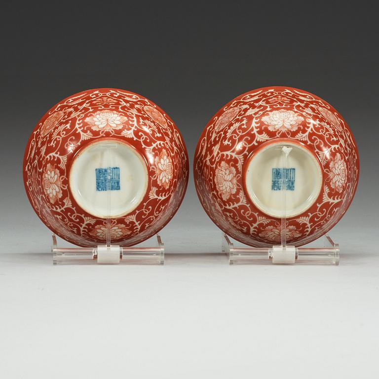 Two coral red ground bowls, late Qing dynasty, with Daoguang and Qianlong mark.