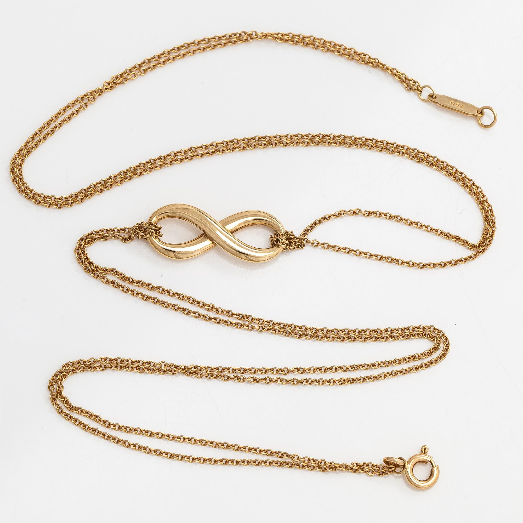 Tiffany & Co, an 18K gold 'Infinity' necklace.
