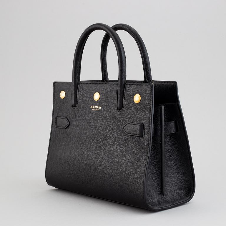 Burberry, a black leather 'Baby Title' handbag, 2019.