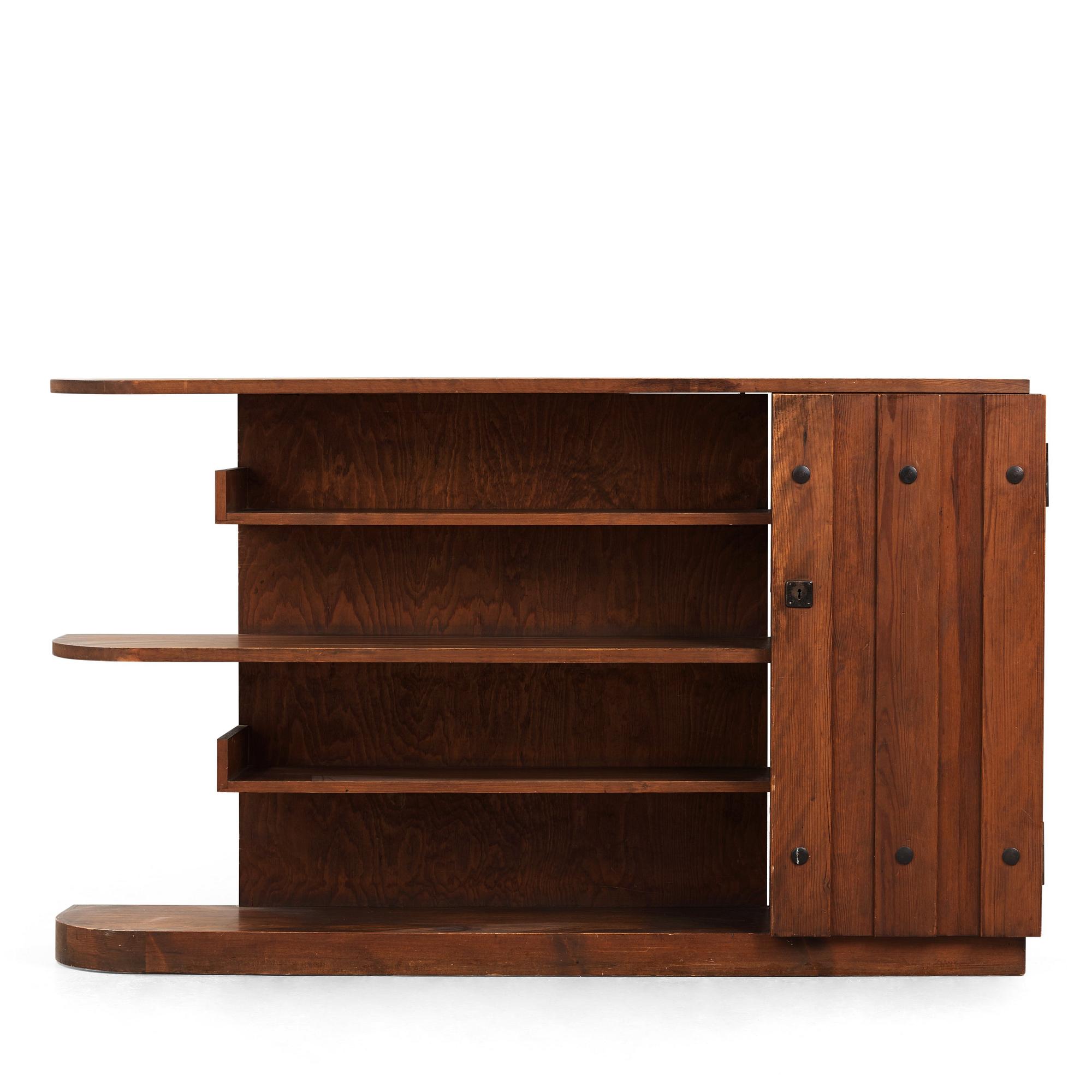 Axel Einar Hjorth, An Axel Einar Hjorth 'Lovö' stained pine bookshelf, Nordiska Kompaniet Sweden 1930's.