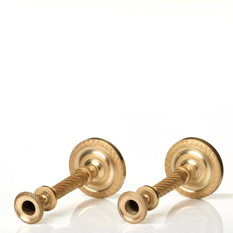 A pair of Empire candlesticks.