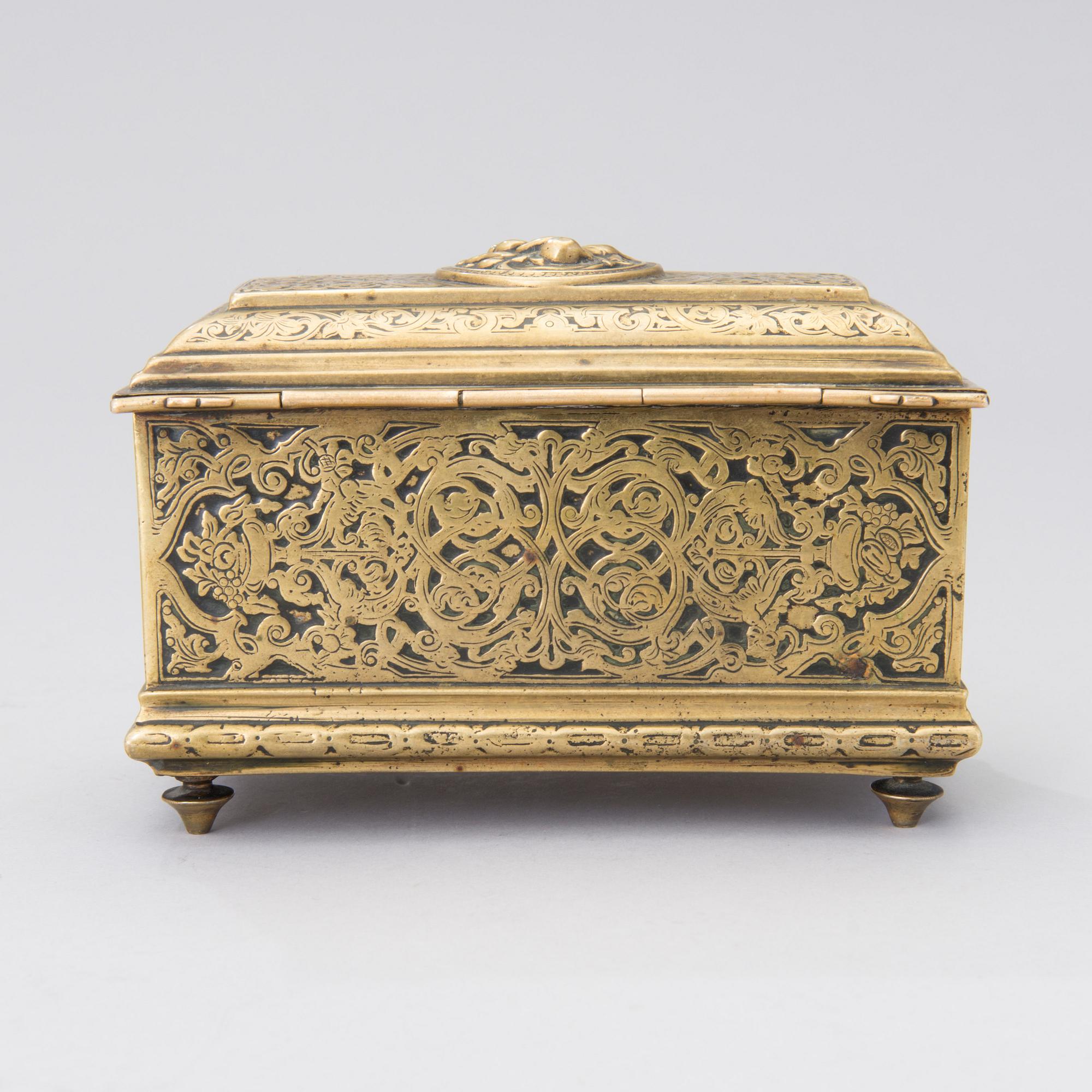 A Renaissance style brass box, Adolf Frankau & Co, London, from the late 19th century.