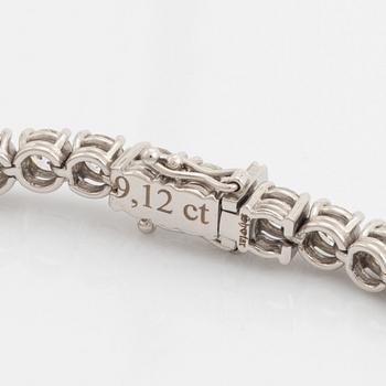 Brilliant-cut diamond tennis bracelet.