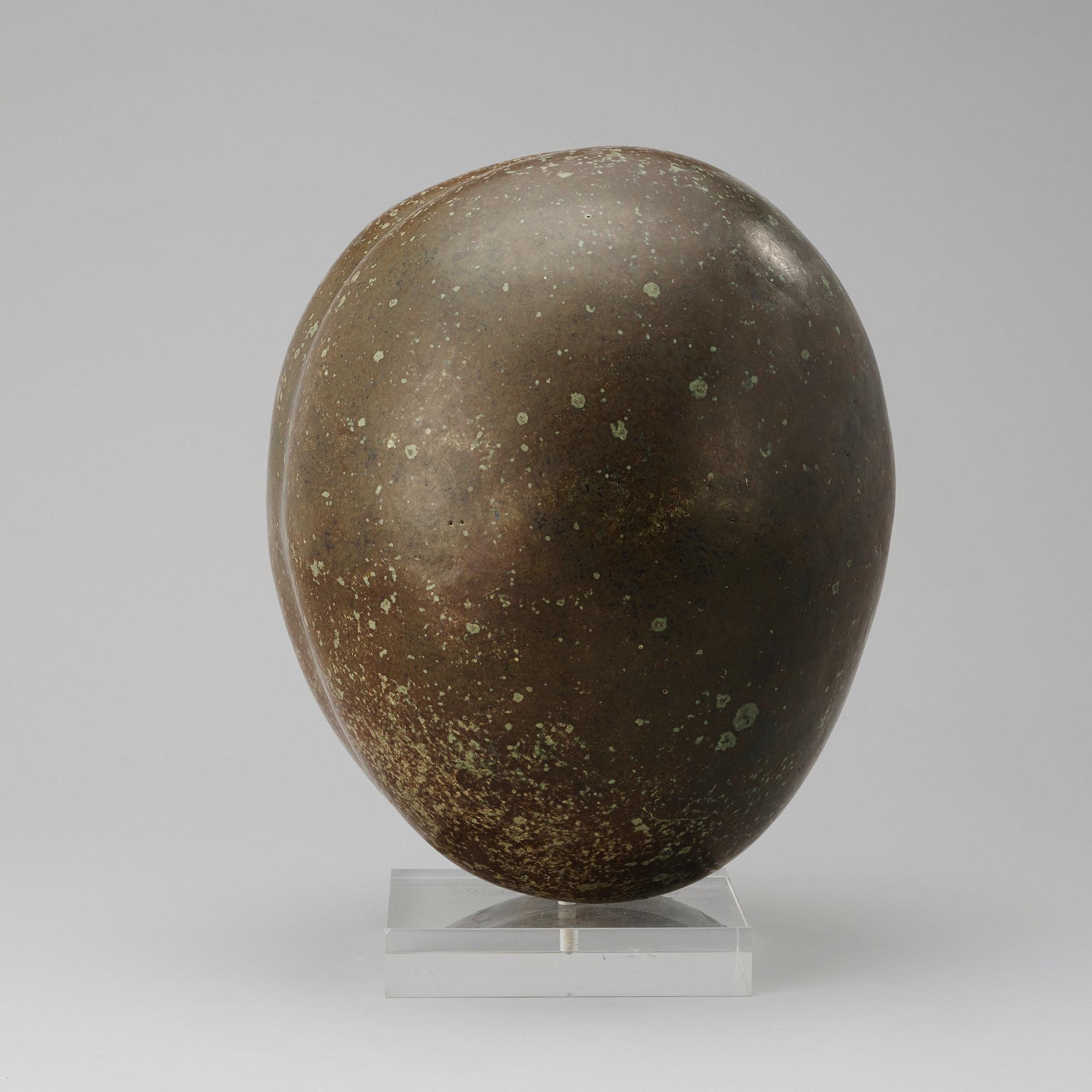 A Hans Hedberg faience sculpture of an olive, Biot, France.
