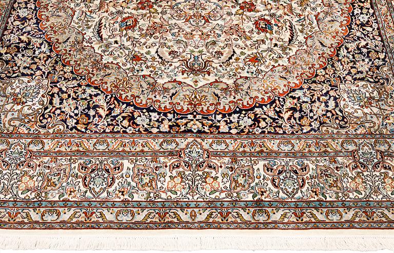 A silk Kashmir carpet, approx. 300 x 200 cm.