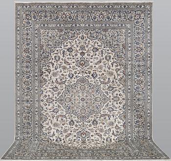 A Kashan carpet, ca 360 x 250 cm.